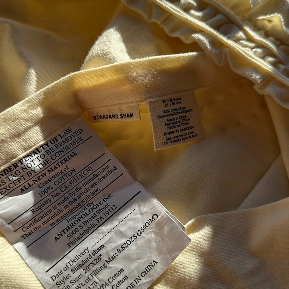 2 Anthropologie standard ruffle “Rivulet” shams in a creamy pale yellow color. - Picture 6 of 16